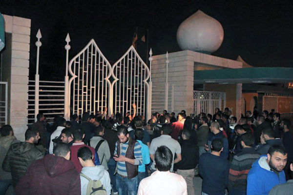 Supporters of University of Jordan students protesting against high tuition fees gather outside UJ's gate in Amman, on Monday (Photo courtesy of Student Rally for the Cancellation of Tuition Fee Hikes)